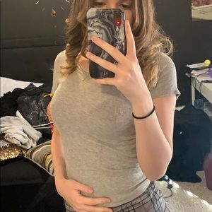 Tight plain grey t-shirt